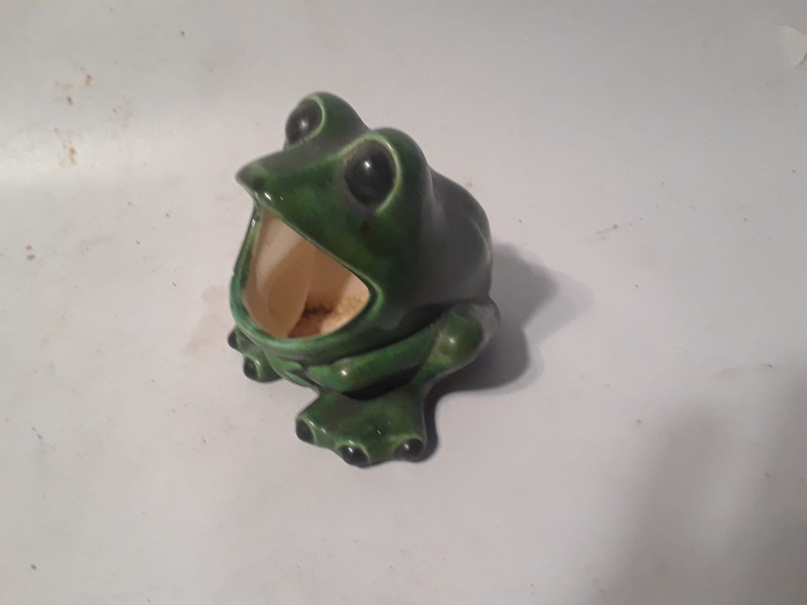 Green frog statute decor